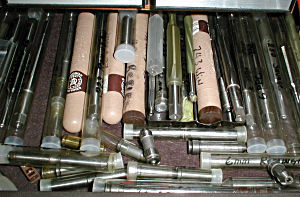 photo of many chamber reamers in a drawer