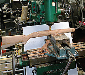 photo of drill press shaping wooden stock